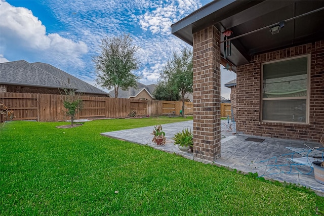 view of yard with a patio