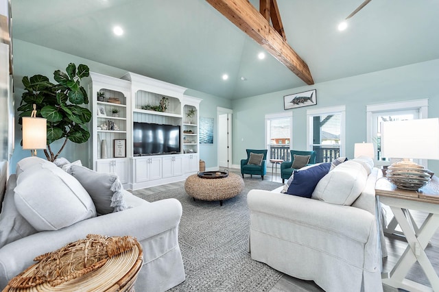 living room with beamed ceiling