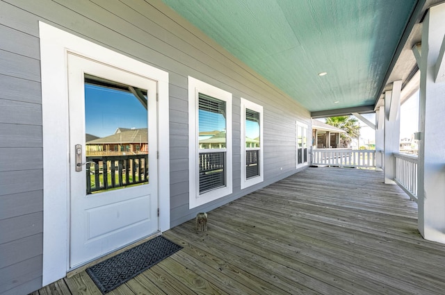 deck with covered porch