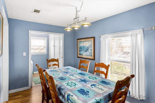 dining room featuring hardwood / wood-style flooring