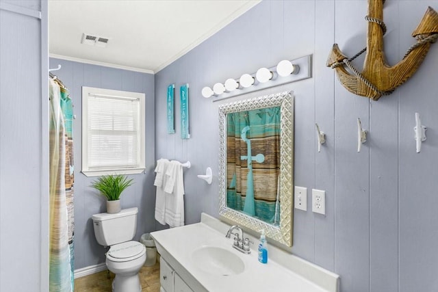 bathroom with vanity, curtained shower, ornamental molding, and toilet