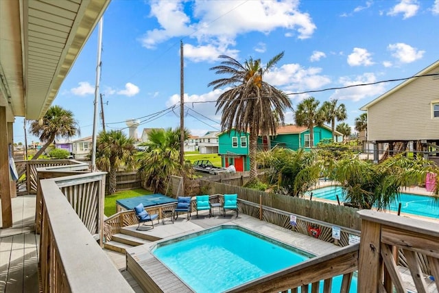 view of pool featuring a wooden deck