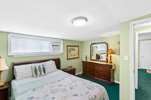 bedroom with dark carpet and a textured ceiling