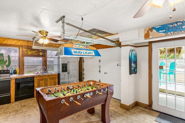 playroom featuring ceiling fan and sink