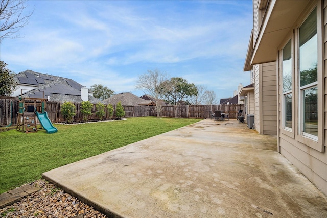 view of patio with a playground