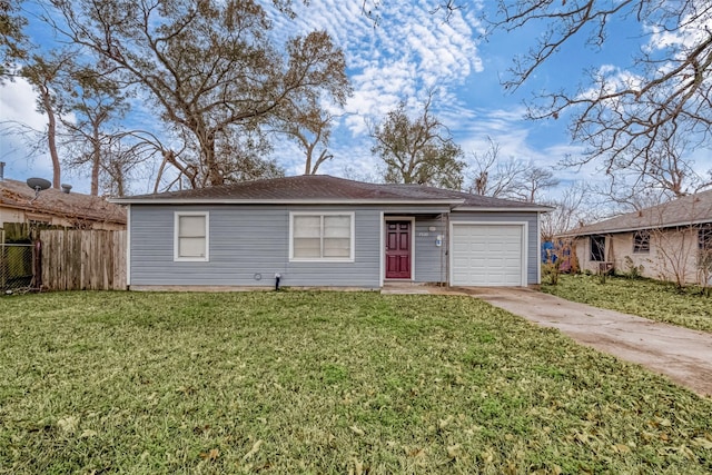 single story home featuring a garage and a front lawn