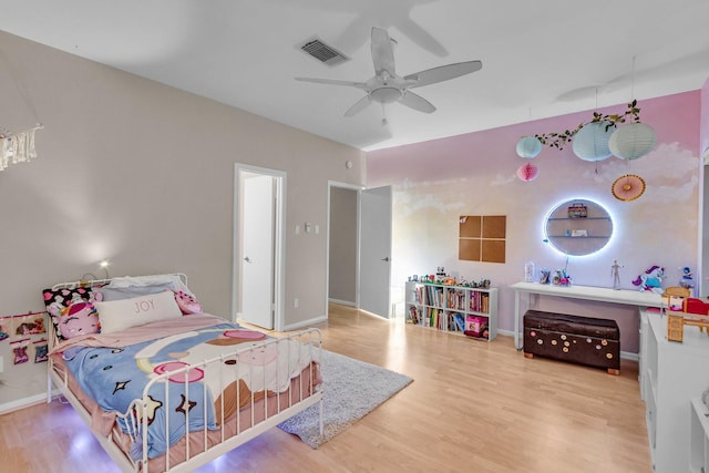 bedroom featuring hardwood / wood-style floors and ceiling fan