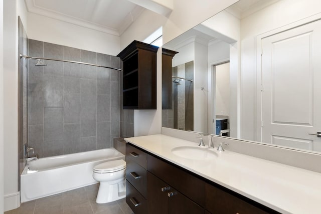 full bathroom with tile patterned flooring, tiled shower / bath combo, vanity, ornamental molding, and toilet