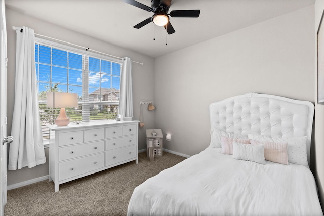 carpeted bedroom featuring ceiling fan