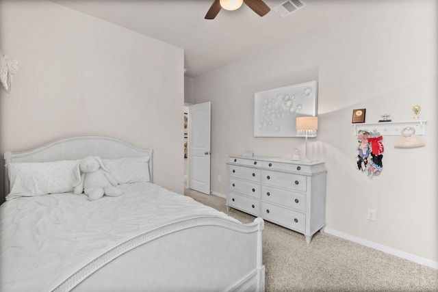 bedroom featuring light carpet and ceiling fan