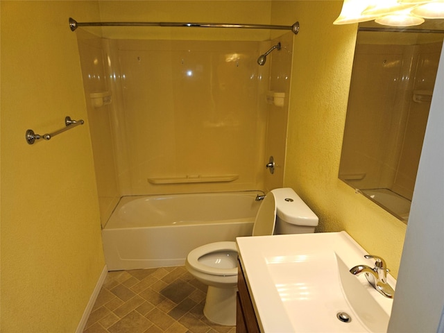 full bathroom with vanity, shower / bathtub combination, and toilet