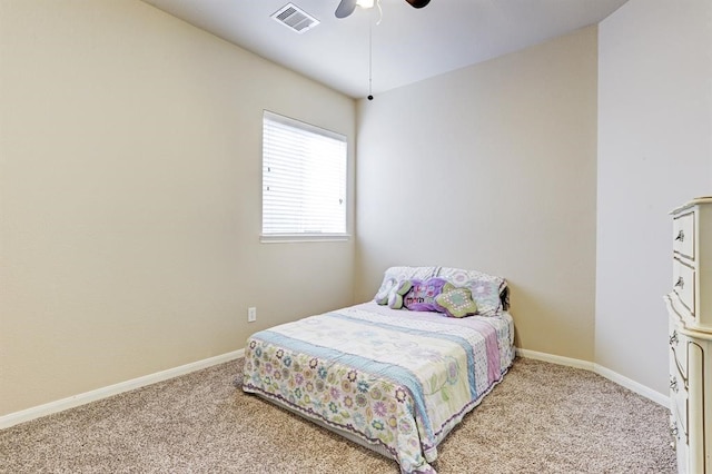 bedroom featuring light carpet and ceiling fan