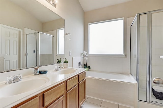 bathroom featuring vanity, tile patterned floors, shower with separate bathtub, and a healthy amount of sunlight