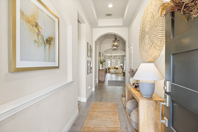 hall with dark hardwood / wood-style flooring