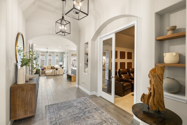 foyer featuring ceiling fan and hardwood / wood-style floors