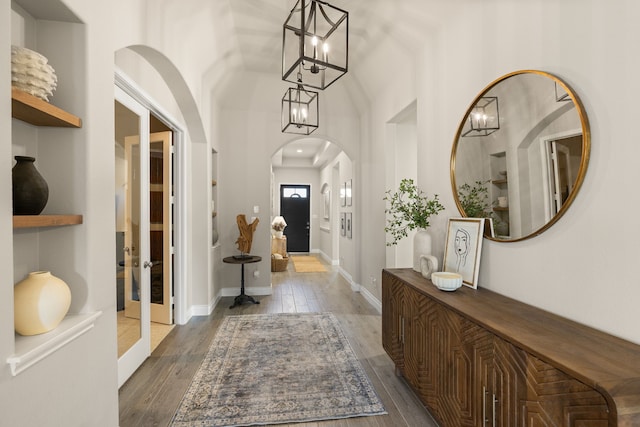 foyer entrance with dark wood-type flooring