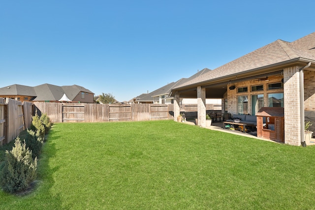 view of yard with a patio area