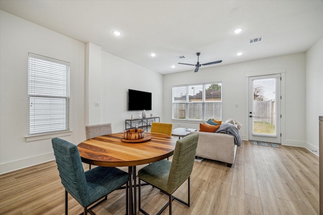 dining area featuring ceiling fan and light hardwood / wood-style floors