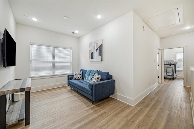 living room with light hardwood / wood-style floors