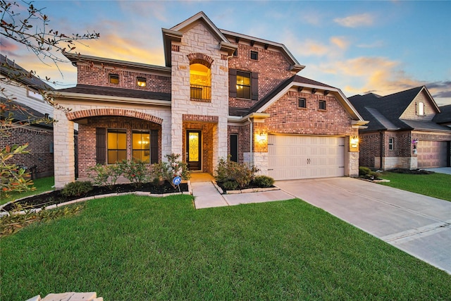 view of front facade featuring a garage, concrete driveway, stone siding, a yard, and brick siding