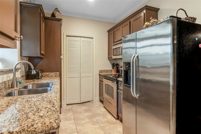 kitchen featuring crown molding, stainless steel appliances, light stone countertops, and sink