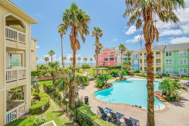 view of swimming pool featuring a patio area