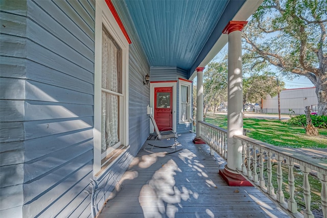 wooden terrace with covered porch