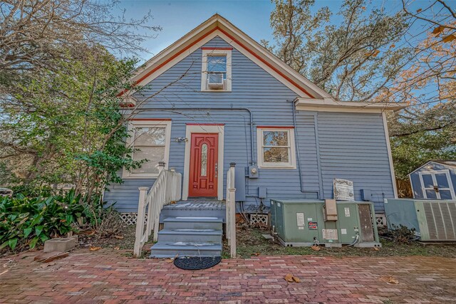 view of front of property featuring central AC unit