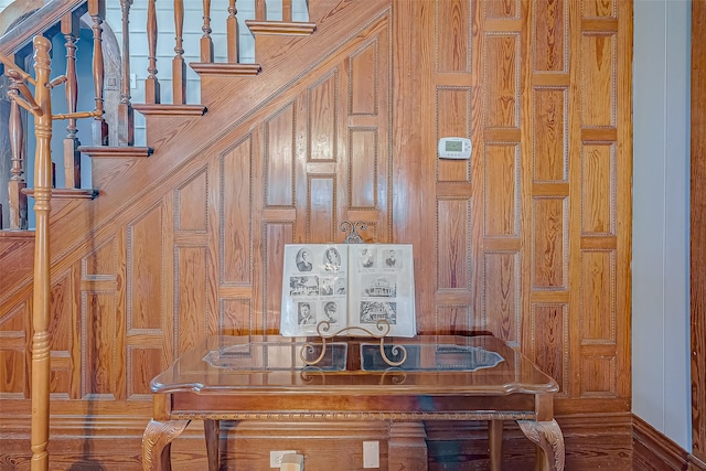 dining area featuring stairway