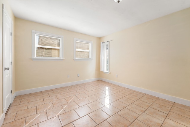 view of tiled spare room