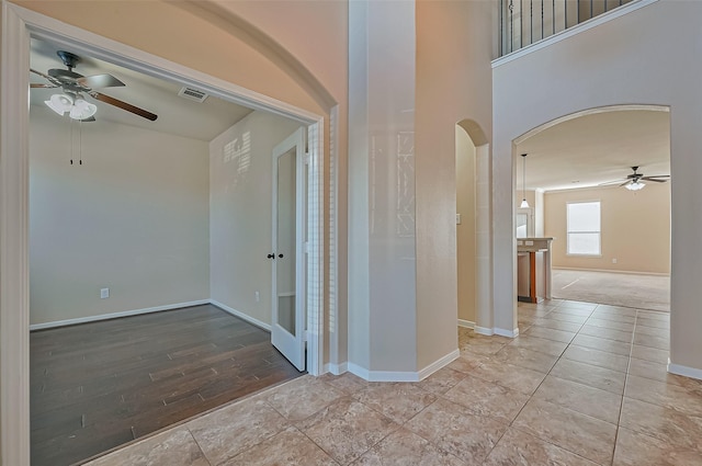 hall with light wood-type flooring