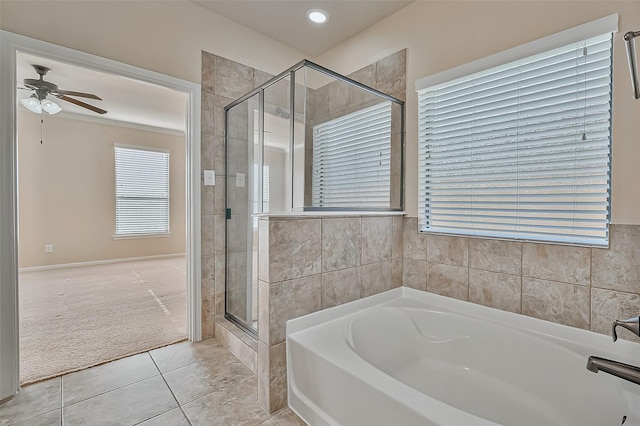 bathroom with ceiling fan, tile patterned floors, and separate shower and tub