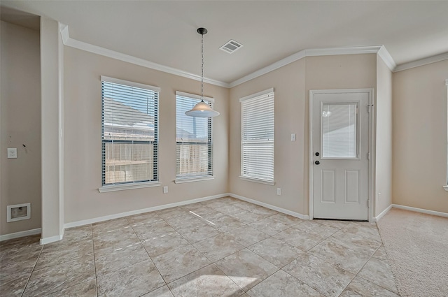 entryway with ornamental molding and light tile patterned floors