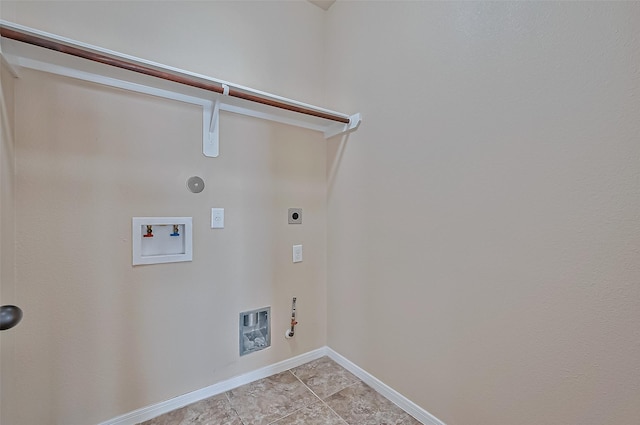 laundry room featuring gas dryer hookup, hookup for a washing machine, and hookup for an electric dryer