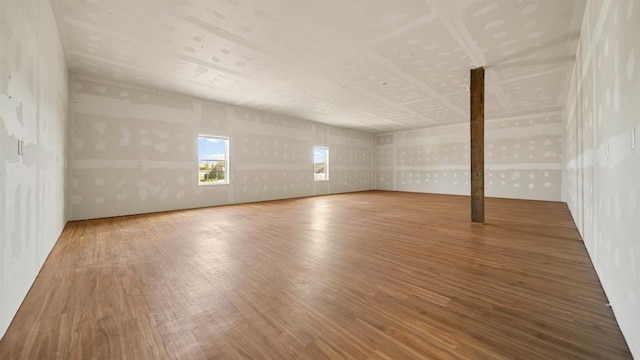 spare room with hardwood / wood-style flooring