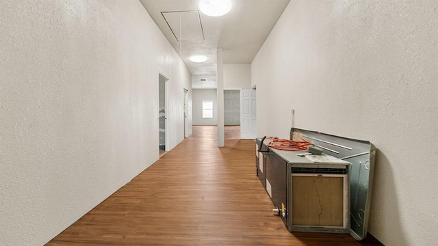 hallway featuring wood-type flooring