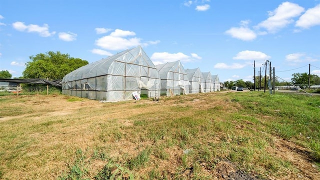 exterior space featuring an outbuilding