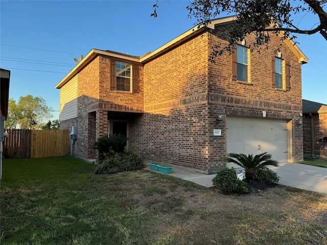 exterior space with a garage and a lawn