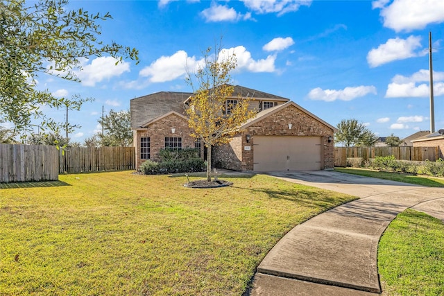 view of front facade with a garage and a front yard