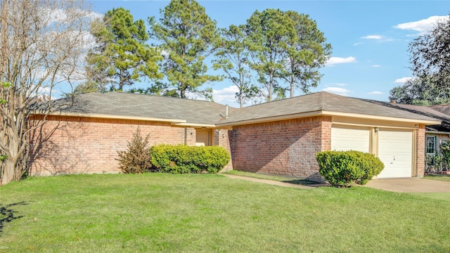 ranch-style house with a garage and a front lawn