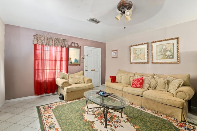 tiled living room with ceiling fan