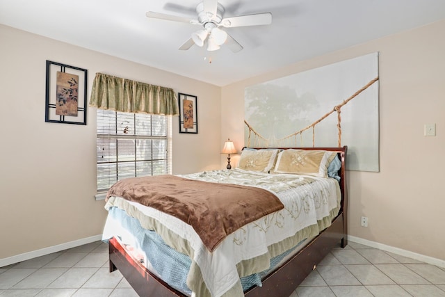 bedroom with ceiling fan and light tile patterned flooring