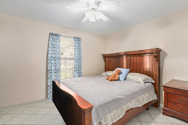 bedroom featuring light tile patterned floors and ceiling fan