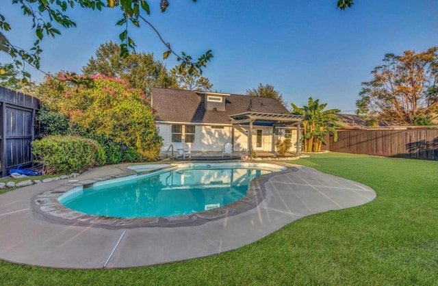 view of swimming pool with a yard and a pergola