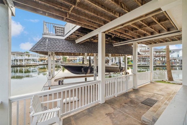 dock area with a water view