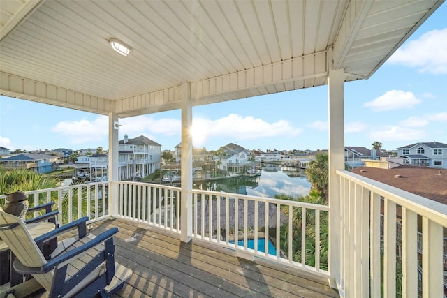 deck featuring a water view