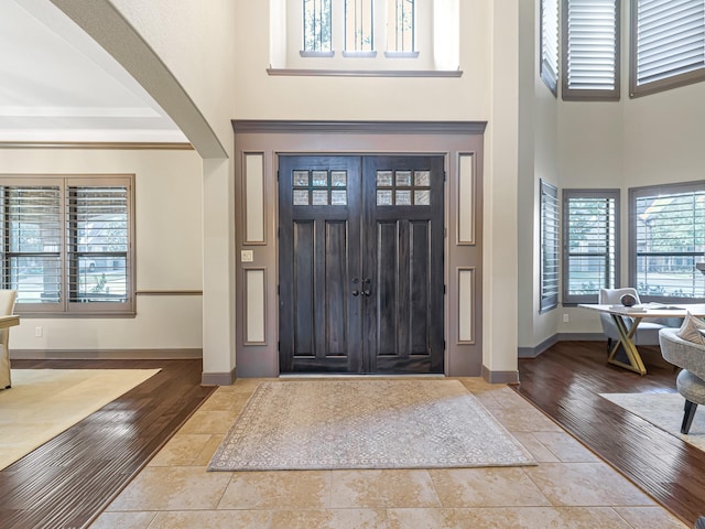 entryway with a high ceiling