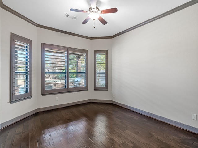 unfurnished room featuring crown molding, ceiling fan, and dark wood-type flooring