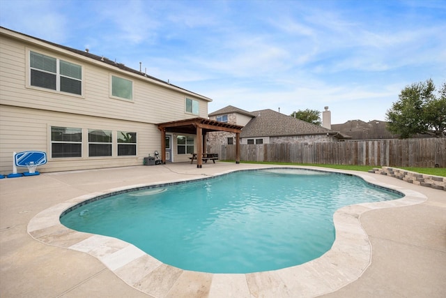 view of swimming pool with a pergola and a patio area