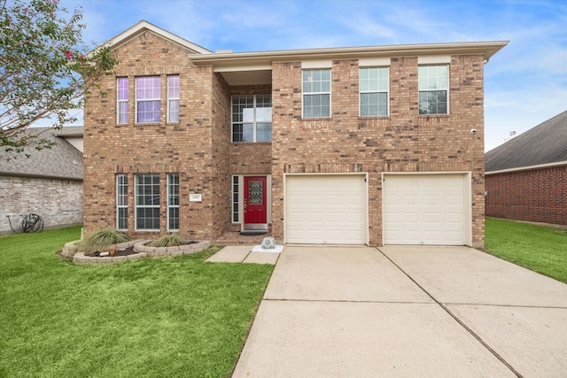 view of front of property featuring a garage and a front lawn